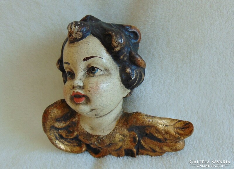 Antique wooden angel, putto