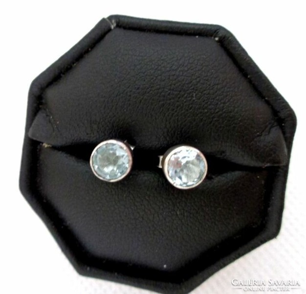Silver faceted blue topaz stud earrings