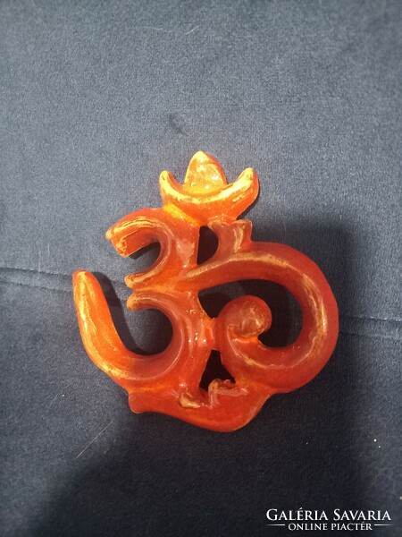 Ohm sign Buddhist Vedelmi symbol in glazed ceramic