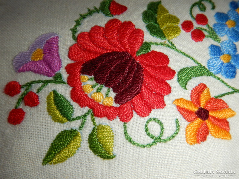 Embroidered tablecloth and placemats
