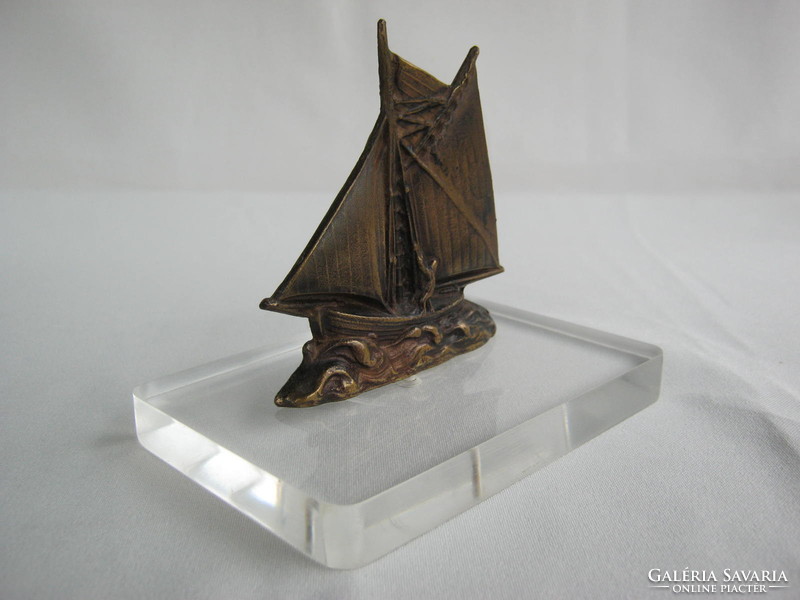 Copper sailing ship on plexiglass base