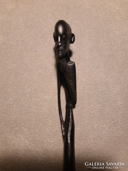 African (Tanzania) thinking man - carved filigree wood sculpture