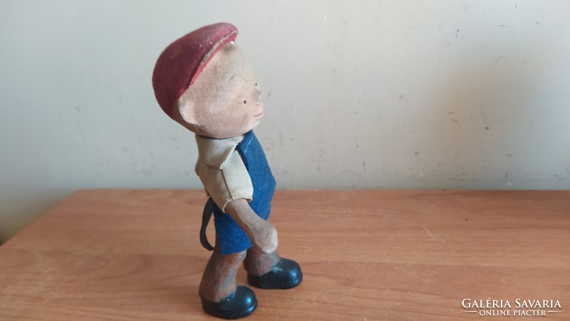 (K) antique toy figure. From material unknown to me.