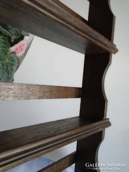 Wooden shelf for collections and small things.