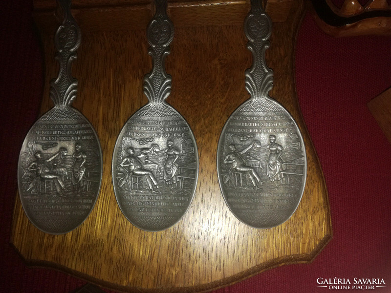 3 decorative pewter spoons in a wall holder - liquidation of collection