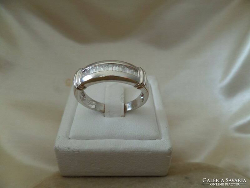 White gold ring with baguette cut bezels