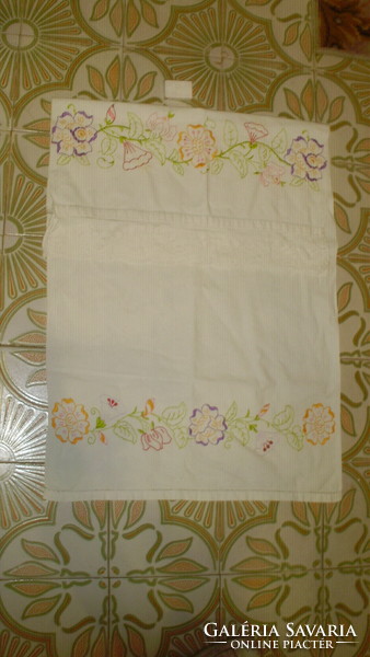 Old embroidered home-woven towel, decorative towel with a crochet border