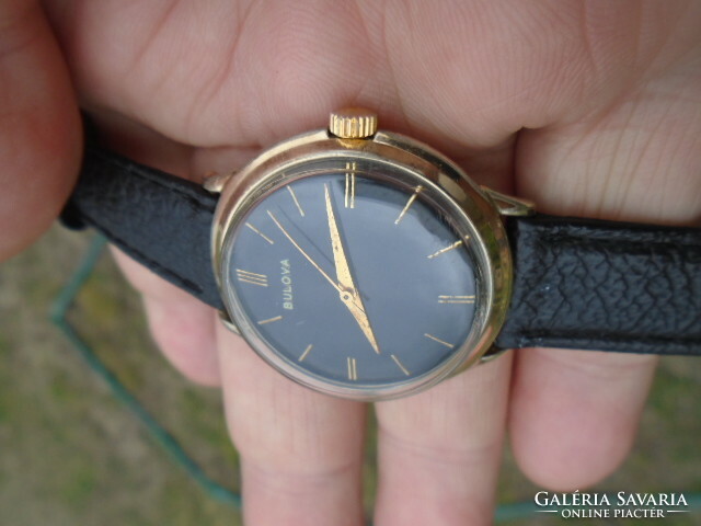 A rare, beautiful and elegant Bulova ffi suit watch with a black dial from the 50s and 60s