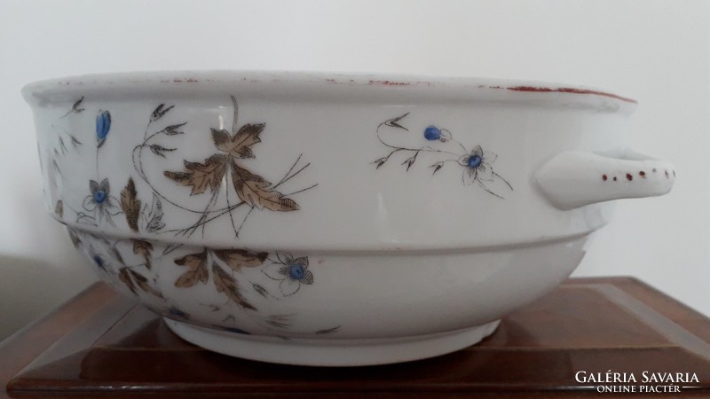 Old porcelain bowl with floral folk comma