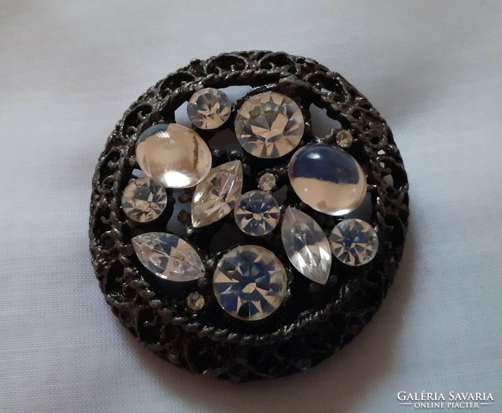 Vintage brooch (pin) decorated with polished glass