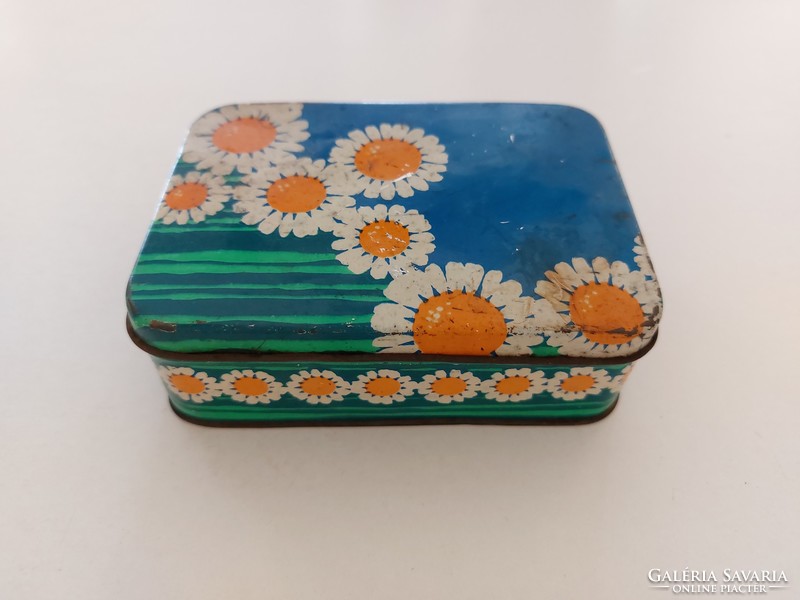 Old metal box with flower box