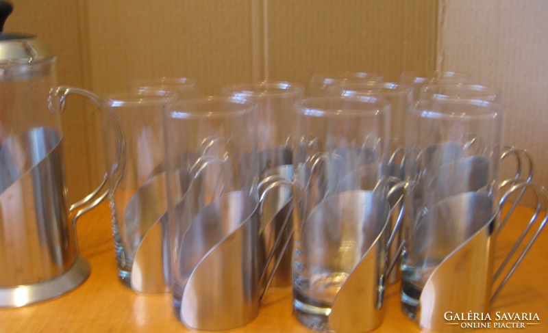 Retro drinking glasses in a curved stainless steel holder