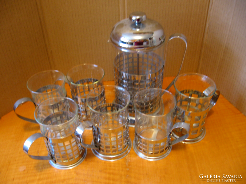 Retro French coffee press pot and accompanying glasses in a stainless steel grid holder