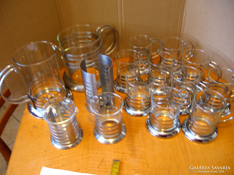 Retro glass jugs in a stainless steel striped holder
