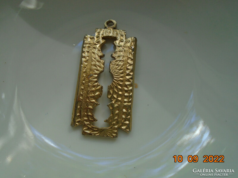 Gilded blade pendant with embossed designs