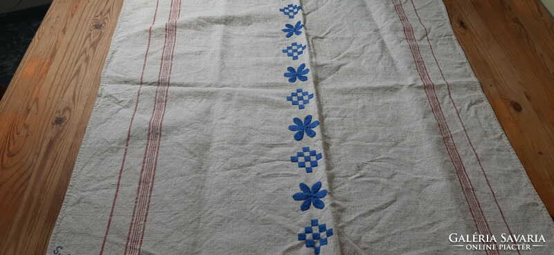 Folk linen with blue embroidery