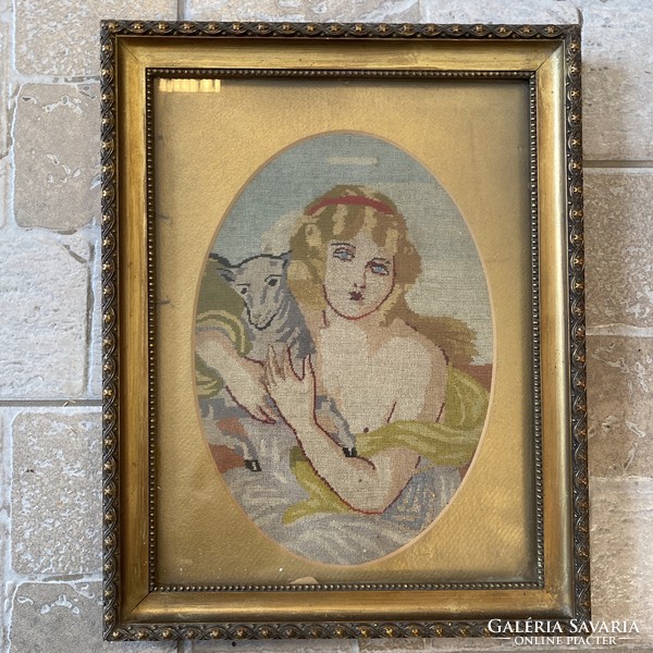 Antique picture frame with needle tapestry