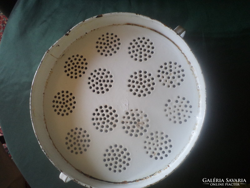 Old, white, two-ear, enameled filter or fruit washer
