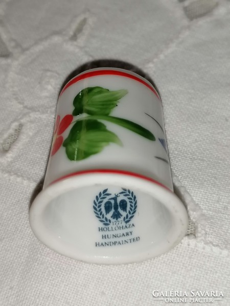 Porcelain thimble with Raven House marking 27.
