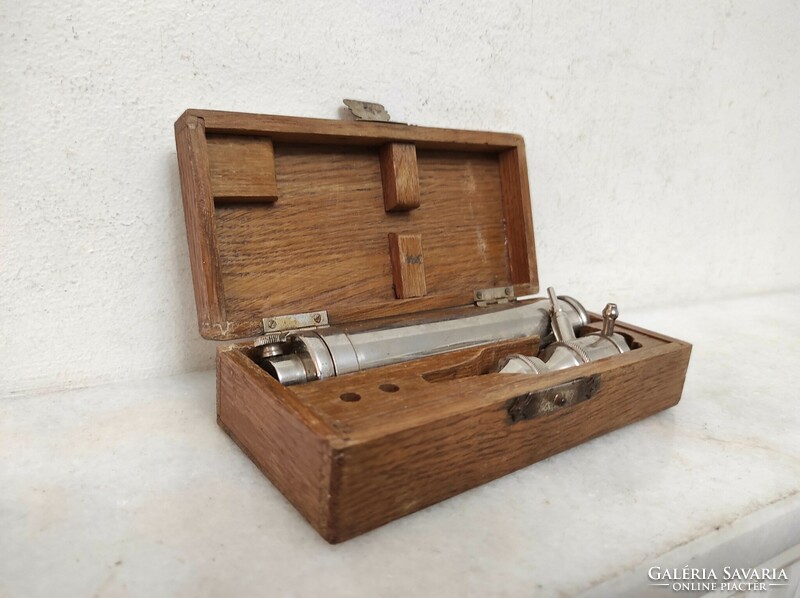 Antique medical device in doctor's pharmacy box healing 81 6689