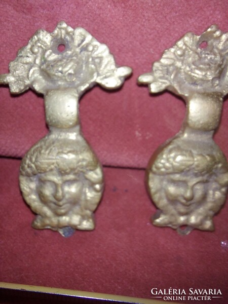 There are only 4 decorative drawer pulls/knockers, copper, the base is separate, the moving ring is separate