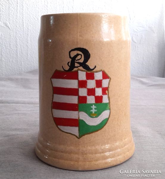 Ceramic jug with coat of arms