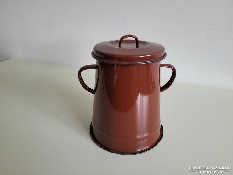 Enameled old vintage brown iron 2 l enameled small pot with lid on a fat bucket