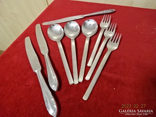 Chrome cutlery, three knives, three forks, three spoons. Villa is Israeli. Jokai.