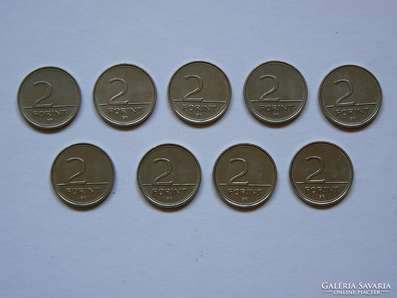 A collection of 9 2 forint mint-bright coins
