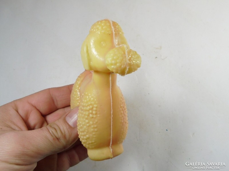 Retro toy plastic poodle dog peddler from the 1970s