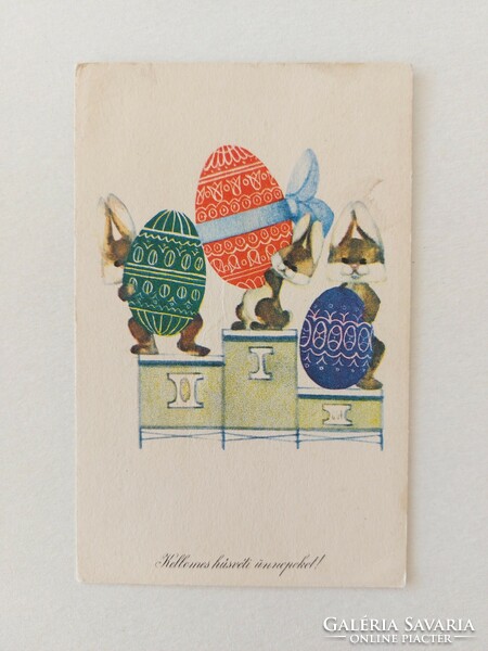Old Easter postcard with cartoon postcard of bunnies and eggs