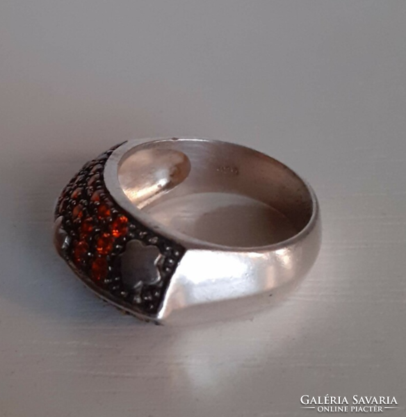 Nice condition hallmarked 925 silver ring set with sparkling tiny orange cubic zirconia stones