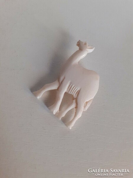Retro camel shaped white carved bone brooch pin with safety pin