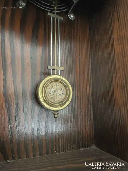 Small spring wall clock