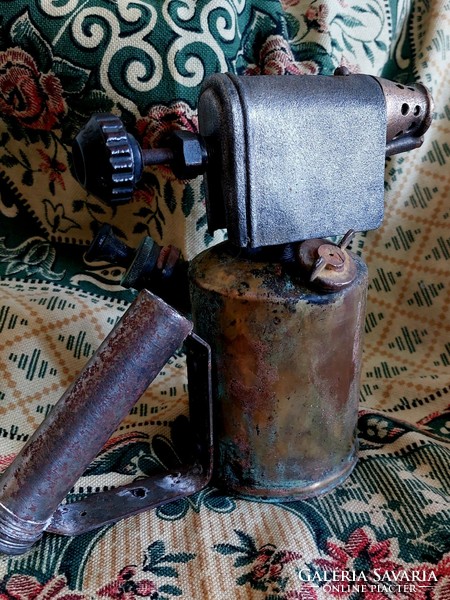 Bat soldering gas lamp with patina.