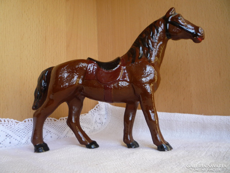 Metal toy horse.