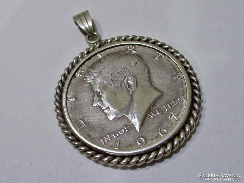 A special silver dollar pendant