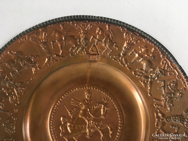 Old, vintage, retro richly decorated, equestrian, hussar scene copper decorative plate, wall plate