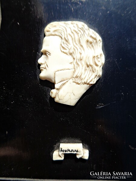 Carved profile picture of Beethoven, wooden base, ornamental object
