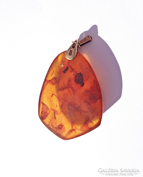 Amber pendant with 875 silver mounting