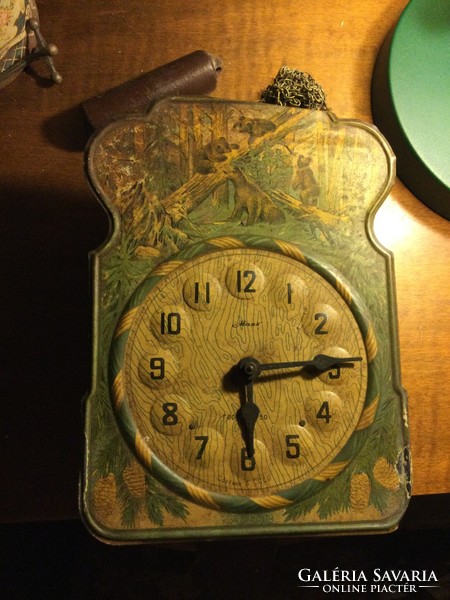 Old Russian wall clock bears in the pine forest
