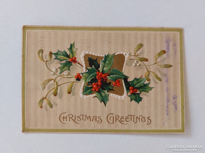 Old Christmas card embossed postcard with mistletoe holly