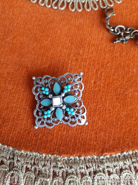 Metal decoration with turquoise_ for making bracelets or other jewelry.