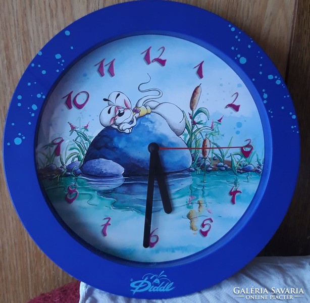 Wall clock with a fairy tale figure.