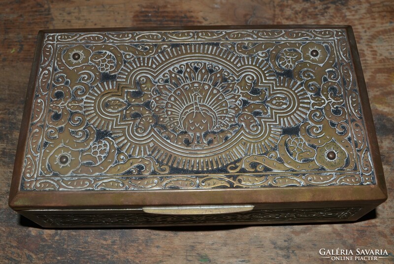 Old brass chest with wooden inlay