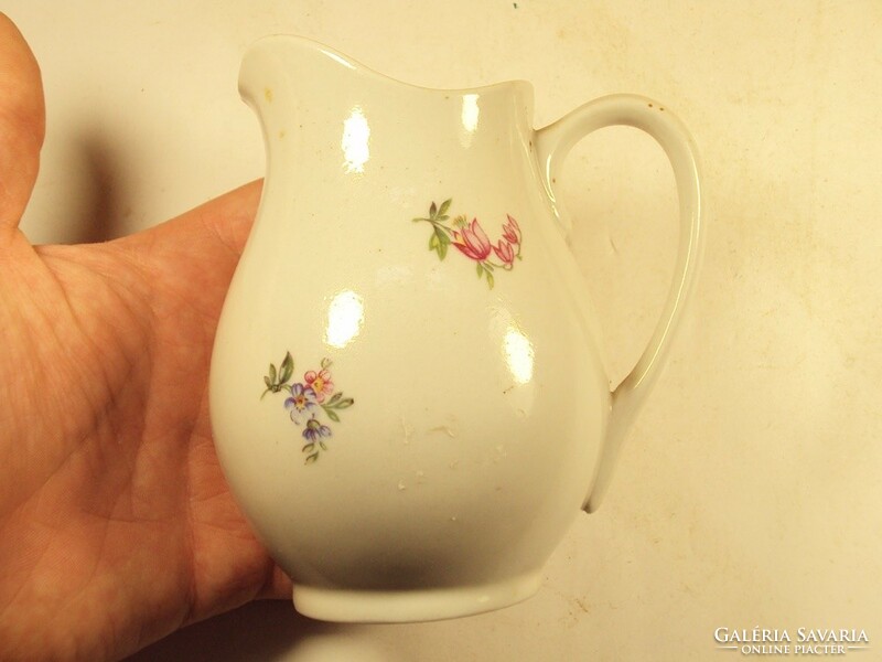 Retro porcelain painted pouring pot with a floral motif