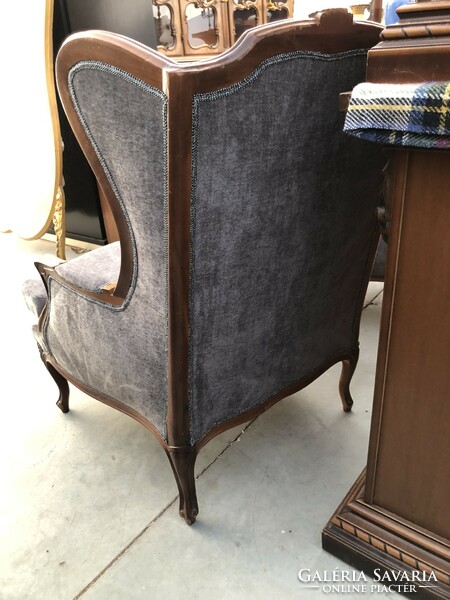 Arched armchair