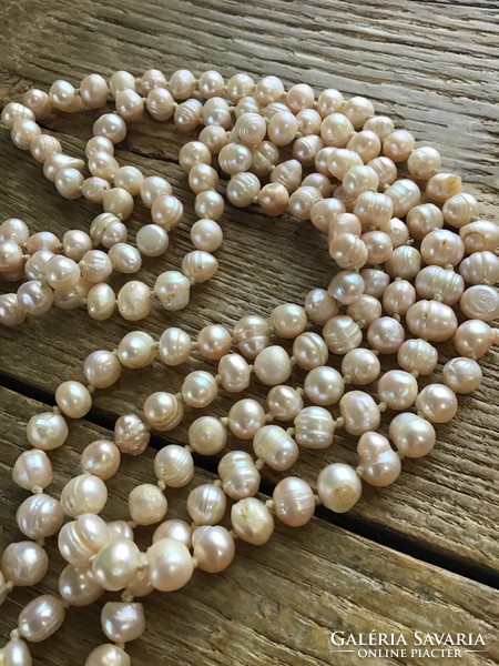 Extra long pearl necklace