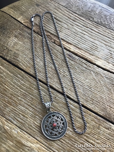 Old handmade long silver necklace with silver pendant and coral stone