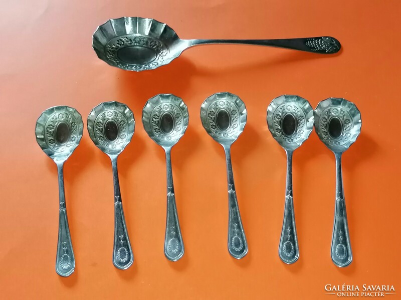 Old, decorative ice cream or dessert spoon set